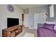 Bedroom featuring a daybed and a furniture console with a wall mounted TV at 3840 Belle Glade St # 104, Las Vegas, NV 89129