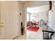 Inviting foyer with tiled floor, leading to the dining room, creating a warm and welcoming ambiance at 3840 Belle Glade St # 104, Las Vegas, NV 89129