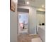 Hallway view leading to a bedroom with neutral walls and carpet at 3840 Belle Glade St # 104, Las Vegas, NV 89129