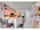 The kitchen features a breakfast bar and stainless steel appliances, ideal for modern living at 3840 Belle Glade St # 104, Las Vegas, NV 89129