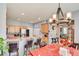 Open-concept kitchen and dining area with bar seating, creating a perfect space for entertaining guests at 3840 Belle Glade St # 104, Las Vegas, NV 89129