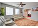 Comfortable living room features cozy seating and a view into the dining area at 3840 Belle Glade St # 104, Las Vegas, NV 89129