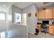 Home office area with custom built-ins, desk space, gray walls and view of adjacent room at 3840 Belle Glade St # 104, Las Vegas, NV 89129