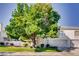 Charming two-story home with mature trees in a well-maintained yard at 447 Temple Canyon Pl, Henderson, NV 89074