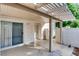 Private covered patio provides an inviting outdoor space with access to the property at 447 Temple Canyon Pl, Henderson, NV 89074