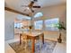 Bright dining area with large windows, flows into the kitchen, offering natural light and views, perfect for casual meals at 4517 Inez Dr, Las Vegas, NV 89130