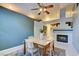 Cozy dining room with a wooden table, stylish chairs, and a view into the adjacent living area at 4517 Inez Dr, Las Vegas, NV 89130