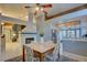 Open concept dining area with tile flooring, fireplace views, and easy access to the kitchen at 4517 Inez Dr, Las Vegas, NV 89130