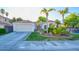 Charming single-story home with a landscaped front yard and well-manicured lawn at 4517 Inez Dr, Las Vegas, NV 89130