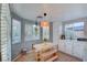 Bright breakfast nook featuring large windows, tile floors and a view to the backyard at 4517 Inez Dr, Las Vegas, NV 89130