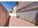 Low-maintenance backyard featuring gravel landscaping and perimeter fencing, providing privacy and utility at 5135 Paradise Valley Ave, Las Vegas, NV 89156