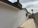 Exterior home architectural details with a gated driveway at 5324 Holmby Ave, Las Vegas, NV 89146