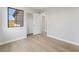 Bright bedroom boasts a window with modern trim and features a closet with a folding door at 6405 Strongbow Dr, Las Vegas, NV 89156
