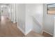 Hallway featuring light colored walls and floors at 6405 Strongbow Dr, Las Vegas, NV 89156