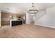 Open kitchen and living area featuring a large kitchen island and stainless steel appliances at 6405 Strongbow Dr, Las Vegas, NV 89156