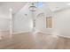 Living area featuring modern lighting, sleek lines, and open floor plan at 6405 Strongbow Dr, Las Vegas, NV 89156