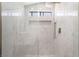 Elegant shower featuring marble and a showerhead at 6405 Strongbow Dr, Las Vegas, NV 89156
