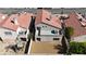 Aerial shot of a charming home showcasing its backyard, roof, and proximity to surrounding houses at 6509 Old Oxford Ave, Las Vegas, NV 89108