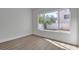Bedroom with new floors and a window with a view of the backyard at 6509 Old Oxford Ave, Las Vegas, NV 89108