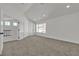 Bright bonus room with carpet and a door leading to the balcony at 6509 Old Oxford Ave, Las Vegas, NV 89108