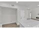 Bright kitchen features white cabinets, white countertops, and new floors at 6509 Old Oxford Ave, Las Vegas, NV 89108