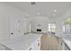 Bright open floorplan kitchen and living area with fireplace and backyard access at 6509 Old Oxford Ave, Las Vegas, NV 89108