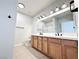 Bathroom with double sink vanity and sleek fixtures, offering modern comfort at 6868 Sky Pointe Dr # 2013, Las Vegas, NV 89131