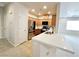 Well-equipped kitchen with stainless steel appliances, granite countertops, and wood cabinets at 6868 Sky Pointe Dr # 2013, Las Vegas, NV 89131