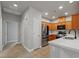 Spacious kitchen with stainless steel refrigerator, wooden cabinets, and bright countertops at 6868 Sky Pointe Dr # 2013, Las Vegas, NV 89131