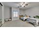 Shared bedroom with comfortable beds, soft carpet and ample natural light from the window at 7256 Bugler Swan Way, North Las Vegas, NV 89084