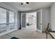 Bonus room with access to multiple rooms and neutral walls and carpet at 7256 Bugler Swan Way, North Las Vegas, NV 89084