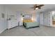 Main bedroom features carpet, neutral walls, and access to the main bath and walk-in closet at 7256 Bugler Swan Way, North Las Vegas, NV 89084