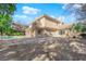 Beautiful backyard with swimming pool and view of the home's exterior at 807 Canyon Greens Dr, Las Vegas, NV 89144