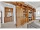 Beautiful built-in shelving with display cases, cabinets, and television at 807 Canyon Greens Dr, Las Vegas, NV 89144