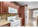 Kitchen with gas stove, microwave, stainless steel fridge, and granite counters at 9000 Las Vegas Blvd # 2243, Las Vegas, NV 89123