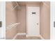 This large walk-in closet features white wire shelving, ample storage space, and a neutral color scheme at 9000 Las Vegas Blvd # 2243, Las Vegas, NV 89123