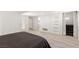 Spacious basement area features lots of natural light and stairs to the upper level at 9228 Whitekirk Pl, Las Vegas, NV 89145