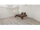 Spacious bedroom features modern shutters with a neutral color palette at 9228 Whitekirk Pl, Las Vegas, NV 89145