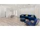 Bright living room features modern decor and dining area with lots of natural light at 9228 Whitekirk Pl, Las Vegas, NV 89145