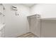 Walk-in closet features shelving and lots of hanging storage at 9228 Whitekirk Pl, Las Vegas, NV 89145