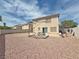 Spacious backyard featuring desert landscaping, a picnic table, and covered outdoor area at 9509 Arrowhead Falls Ct, Las Vegas, NV 89148