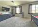 Spacious bedroom offers natural light and neutral colors, creating a relaxing atmosphere at 9509 Arrowhead Falls Ct, Las Vegas, NV 89148