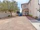 Home with low maintenance desert landscaping and a large space for parking at 9509 Arrowhead Falls Ct, Las Vegas, NV 89148