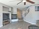 Features include fireplace, entertainment system, wood floors, and access to stairway at 9509 Arrowhead Falls Ct, Las Vegas, NV 89148