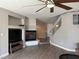 Features include fireplace, entertainment system, wood floors, and access to stairway at 9509 Arrowhead Falls Ct, Las Vegas, NV 89148