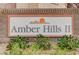 Amber Hills II community sign with manicured greenery at , Las Vegas, NV 89118