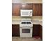 Kitchen showing white appliances, lots of storage space and neutral countertops at , Las Vegas, NV 89118
