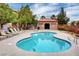 Community pool with lounge chairs, a spa, and a cabana, perfect for relaxation and social gatherings at , Las Vegas, NV 89118
