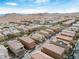 Panoramic aerial view of a residential community with various two-story homes and mountain views at 10943 Ketchikan St, Las Vegas, NV 89179
