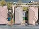 Aerial view of a house with a paver patio, artificial grass, and lush landscaping at 10943 Ketchikan St, Las Vegas, NV 89179